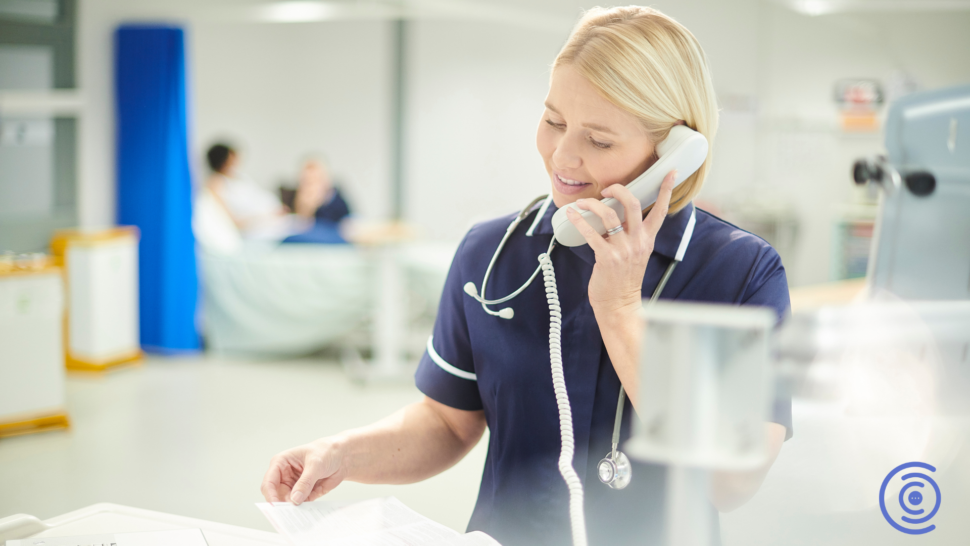 Healthcare receptionist taking a phone call